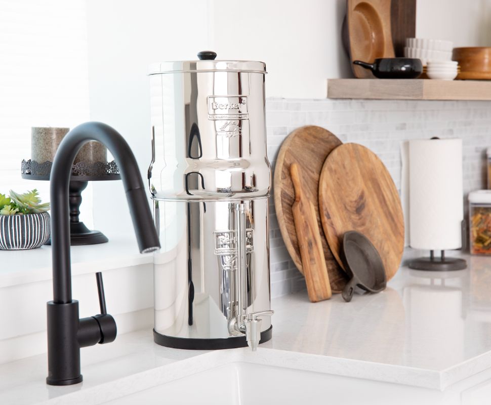 New Stainless Steel Berkey Water View™ Spigots New stainless steel Berkey water view spigots on a Berkey system in a kitchen.
